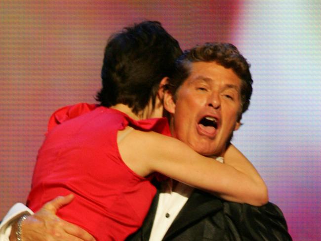 Singer Missy Higgins jumps into the arms of David Hasselhoff after winning Album of the Year at the Aria Awards in Homebush Bay, Sydney.