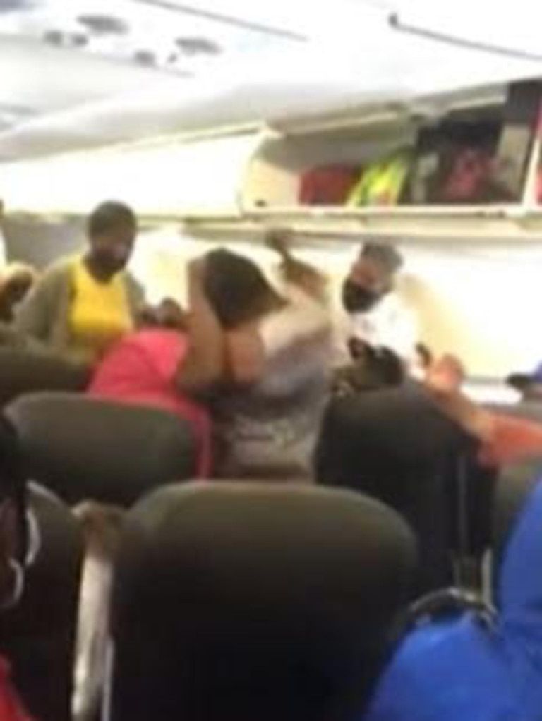 Woman’s face mask meltdown caught on video as she’s kicked off plane ...