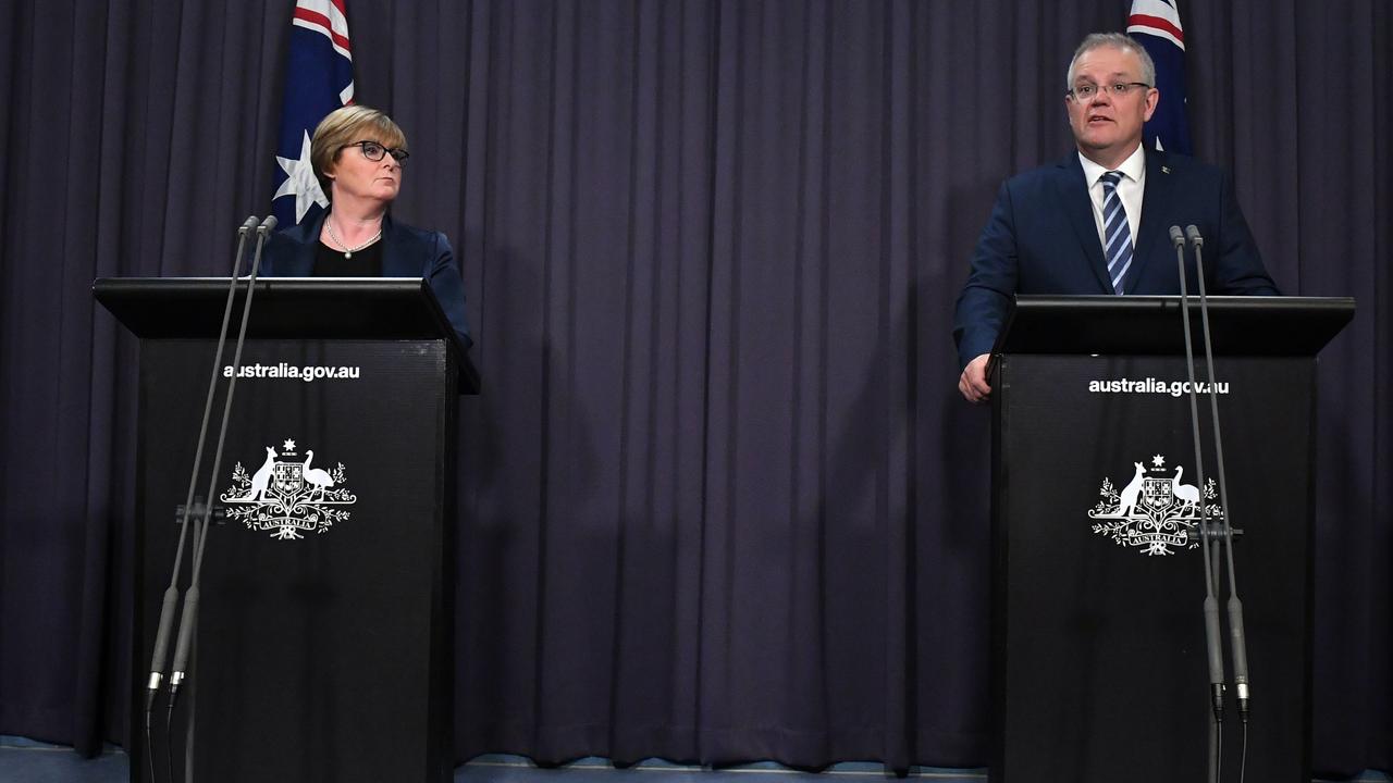 Defence Minister Linda Reynolds and Prime Minister Scott Morrison discussing the cyber attack last week. Picture: AAP