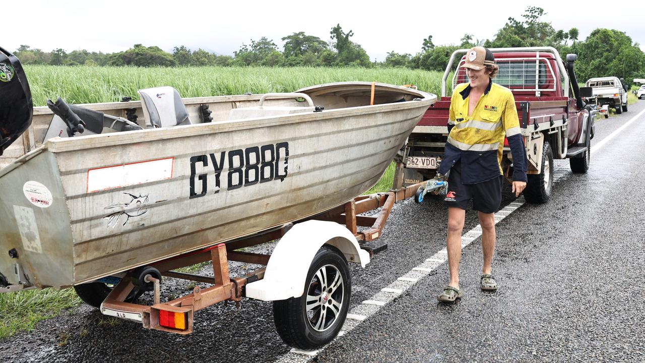 More wet weather forecast for the region in coming days. Tully residents Luke Leoni puts his tinnie back onto his trailer. File photo. Picture: Brendan Radke