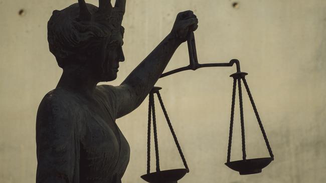 BRISBANE , AUSTRALIA - NewsWire Photos - BRISBANE , JUNE 24 2024: Generic photo of the scales of justice stature outside Brisbane Supreme Court in the Brisbane CBD. Picture: NewsWire / Glenn Campbell