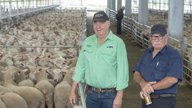 Garry Whitehead from Nutrien Mortlake with Derek Anders from Hexham at the Ballarat first cross ewe sale. Picture: Zoe Phillips