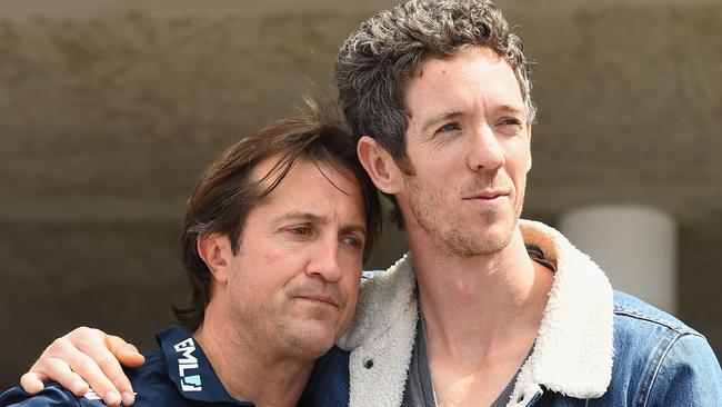 Luke Beveridge and Robert Murphy at the Bulldogs’ premiership celebrations. Picture: Getty Images