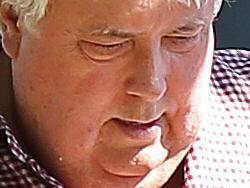 10/4/2016: Clive Palmer returns to his car at his local shops at Paradise Point , Gold Coast. A report comes down this week into his nickel refinery later this week. Lyndon Mechielsen/The Australian