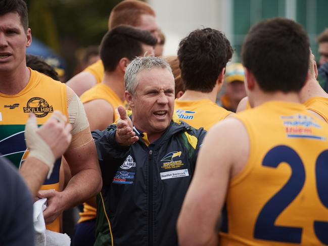 Woodville SANFL Coach Michael Godden talking to players at Maughan Thiem Hyundai Oval in Woodville South, Sunday, Aug. 20, 2017. (AAP Image/MATT LOXTON)