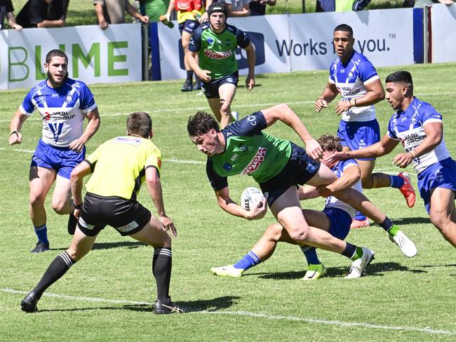 Jesse Milin reaches out to score one of his four tries against Canterbury. Picture: Martin Ollman