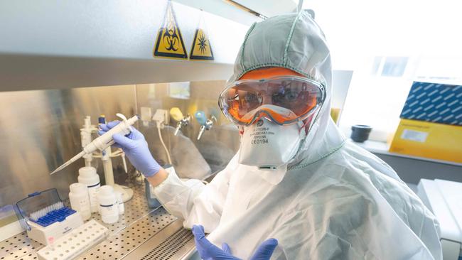 Molecular biologist William Dundon runs a test to detect whether a person has been infected with COVID-19, at the IAEA's Laboratories in Seibersdorf, Austria. Picture: AFP