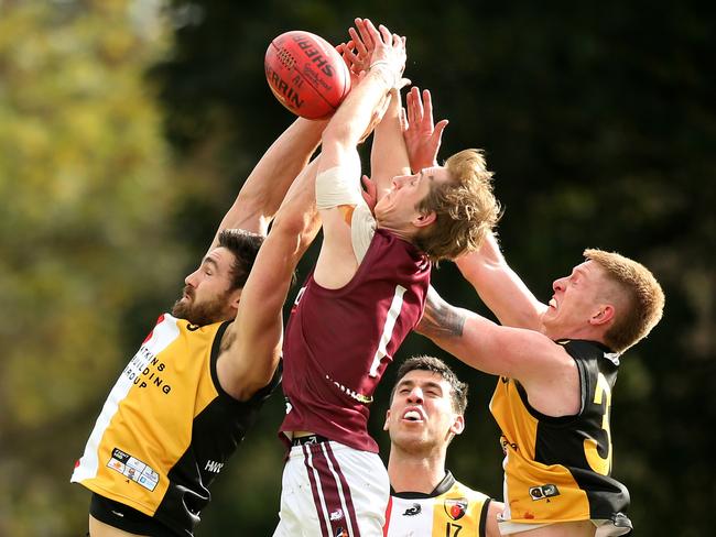 Slape (right) contests a ball against Prince Alfred Old Collegians. Picture: Dean Martin