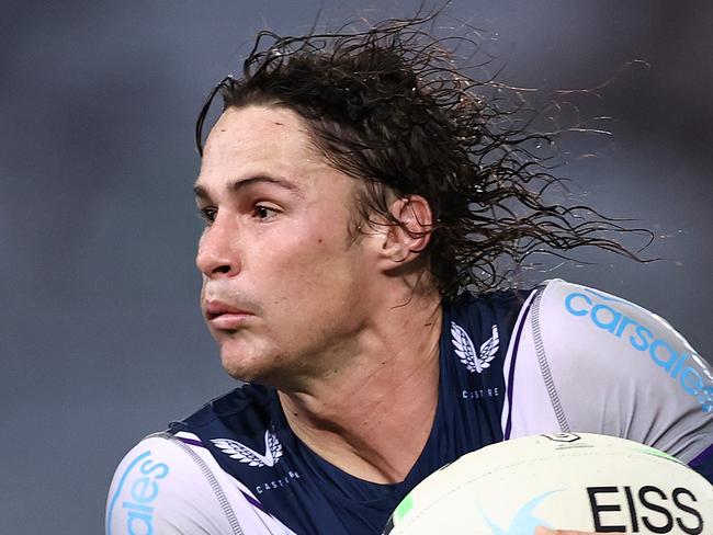 SYDNEY, AUSTRALIA - MAY 06:  Nicho Hynes of the Storm is tackled during the round nine NRL match between the South Sydney Rabbitohs and the Melbourne Storm at Stadium Australia on May 06, 2021, in Sydney, Australia. (Photo by Cameron Spencer/Getty Images)