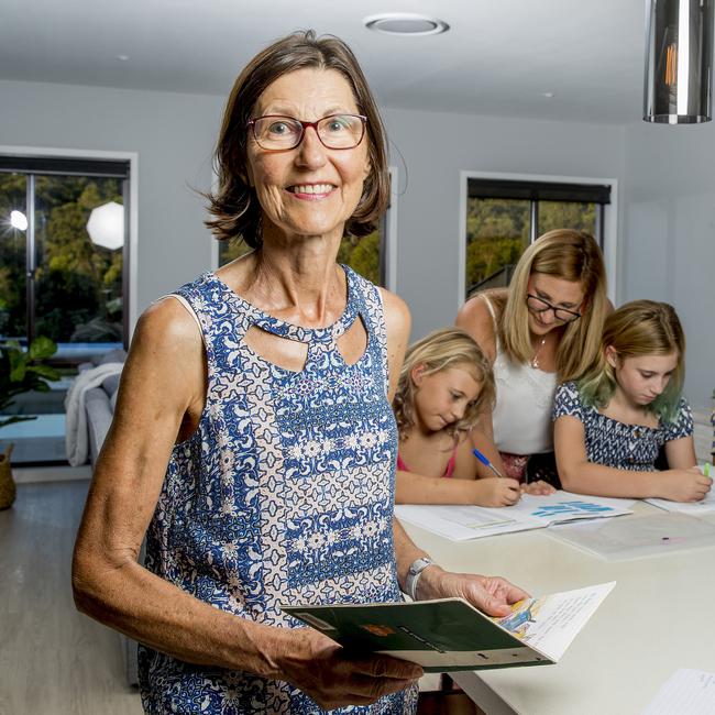 Jenny Johnson helped her daughter Robyn de Beer home schooled her children Lexie-Rose and Hollie during lockdowns on the Gold Coast in 2021. Picture: Jerad Williams