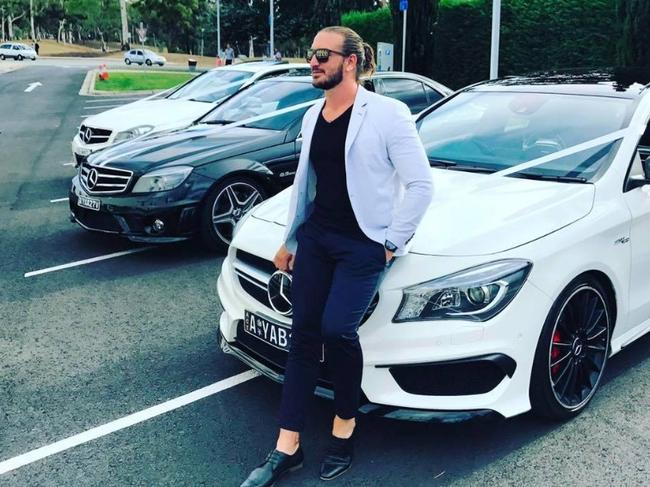 Accused Canberra drug trafficker Brendan Baker with his beloved Mercedes.