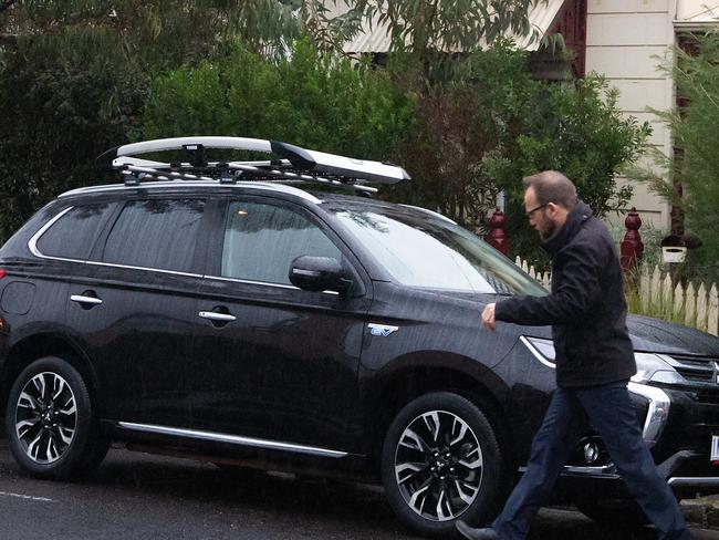 Adam Bandt getting into his car outside his home. Picture: Sarah Matray