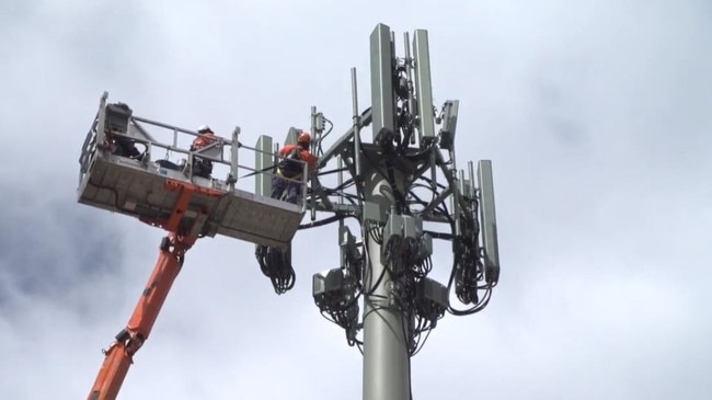 A 5g mobile tower being installed.