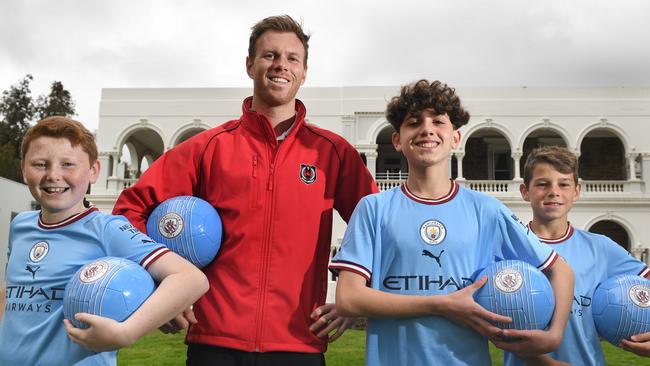 Henry Askem, Rostrevor soccer co-ordinator Daniel Mullen, Christian Tassotti and Ryder Dalton are excited at their new opportunity to excel. Picture: Tricia Watkinson