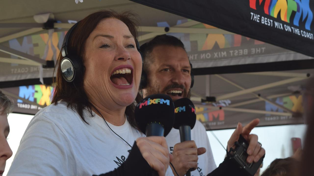 An emotional moment as 92.7 Mix FM breakfast announcers Caroline Hutchinson and Mark Darin discover they have smashed their $600,000 fundraising goal for the Give Me 5 for Kids appeal.