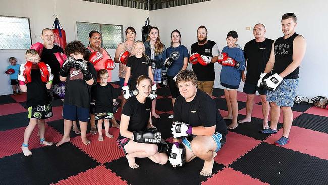 MARTIAL ARTS: Courtney Rainbow and Jack McInnes with some of the students at Rippers Gym Muay Thai Hervey Bay. Picture: Alistair Brightman