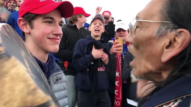 Nick Sandmann confronts Nathan Phillips. Picture: Reuters.