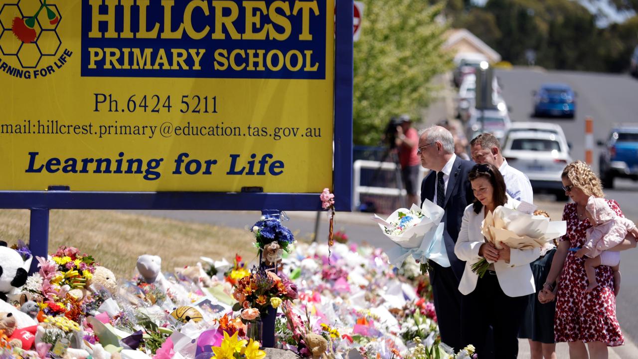 TASMANIA, AUSTRALIA - NewsWire Photos: DECEMBER 18 2021: Former Prime Minister Scott Morrison his wife Jenny lay flowers in tribute outside Hillcrest Primary School. Picture: NCA NewsWire / Grant Viney