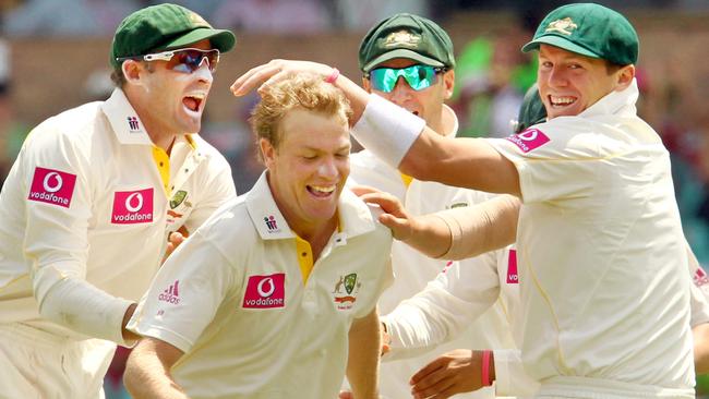 Michael Beer celebrates his first test wicket in 2011. The spinner has now called time on his career.