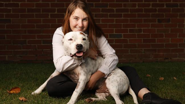 Grace Hills with her dog Max the three year old Staffy that survived a snake bite resulting in a vet bill worth $25,000 of treatment.  Picture: Nikki Davis-Jones