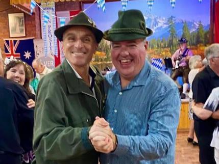 Geelong councillors Eddy Kontelj and Anthony Aitken get into the swing of things at the Austrian Club's Oktoberfest event. Picture: Facebook.