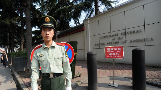 A Chinese paramilitary policeman standing guard at the entrance of the US consulate in Chengdu, southwest China's Sichuan province. Picture: AFP