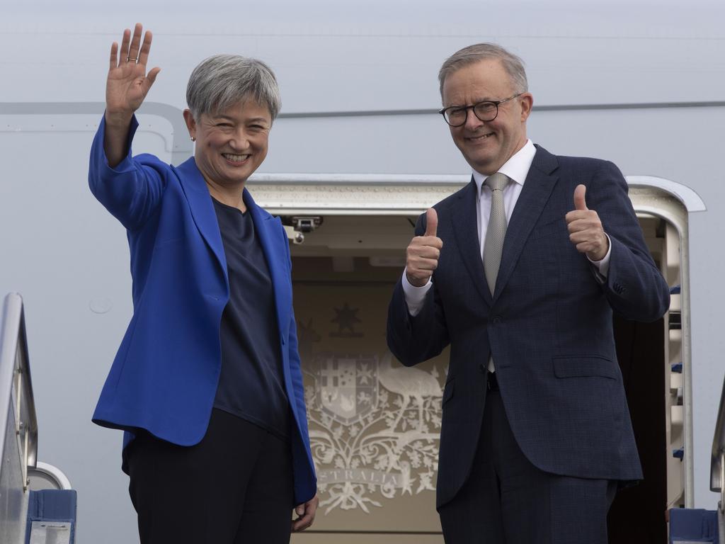 Prime Minister Anthony Albanese and the new Foreign Minister Penny Wong board the RAAF jet for the Quad meeting in Japan. Picture: NCA NewsWire / Andrew Taylor