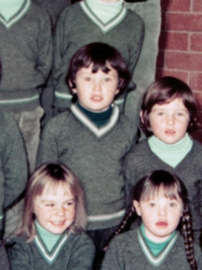 Dave Hughes (centre, in dark skivvy) in a class photo at St Pius X in Warrnambool.