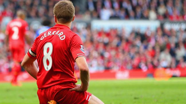 Steven Gerrard of Liverpool on the turf after his slip allowed Demba Ba to score.