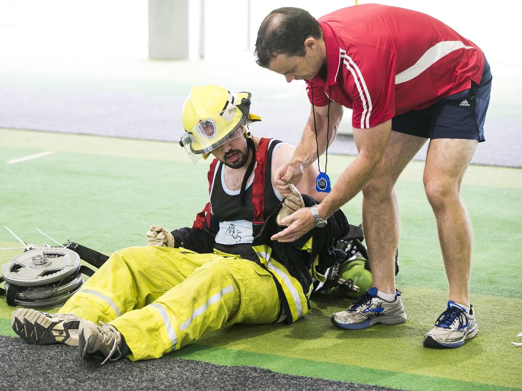 ***SUNDAY TELEGRAPH SPECIAL***  Fire and Rescue NSW try outs. Steven Chiara exhausted from the course. Picture: Dylan Robinson