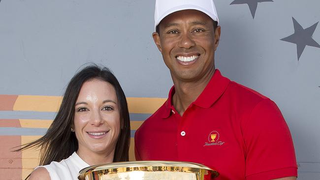 Erica Herman and Tiger Woods in Melbourne last year to promote the Presidents Cup. Picture: Michael Klein