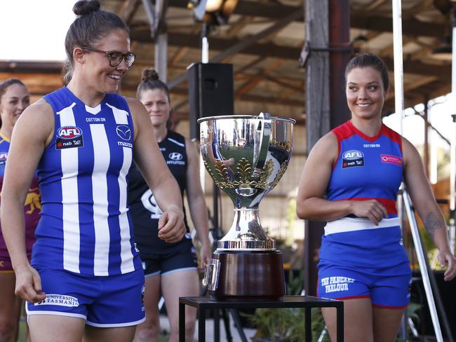 (L-R) Leah Kaslar, Emma Kearney, Bri Davey and Ellie Blackburn are seen during the 2019 AFLW launch in Port Melbourne, Wednesday, January 30, 2019. (AAP Image/Daniel Pockett) NO ARCHIVING