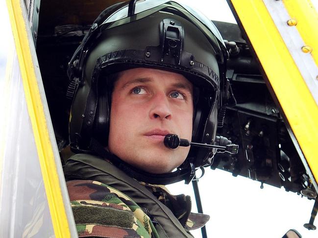 File - This is a file photo dated March 31 2011 of Britain's Prince William, the Duke of Cambridge, at the controls of a Sea King helicopter.    Prince William will be deployed to the politically sensitive Falkland Islands next year as an air force search and rescue pilot, Britain's defense ministry said Thursday,  Nov. 10, 2011. The second in line to the British throne will spend six weeks in February and March at the British outpost 290 miles (460 kilometers) east of Argentina's coast in the Atlantic Ocean, the Defense Ministry said Thursday. (AP Photo / John Stillwell / PA, file) UNITED KINGDOM OUT NO SALES NO ARCHIVE