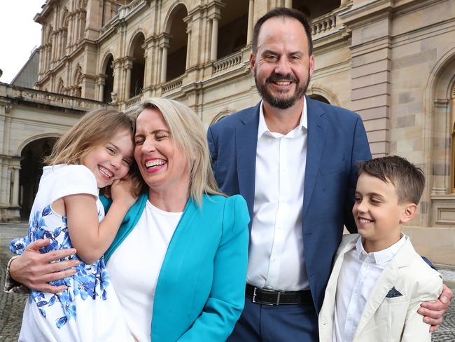 Minister Kate Jones outside Parliament House with her family, husband Paul Cronin, son Thomas, and daughter Grace, after announcing she will not contest the October 31 state election, quitting State Parliament, Brisbane. Photographer: Liam Kidston