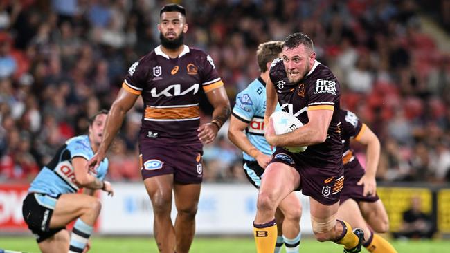 The Bulldogs were rumoured to be interested in Payne Haas (left), as Brisbane have been rewarded for signing Kurt Capewell (right). Picture: Bradley Kanaris/Getty Images