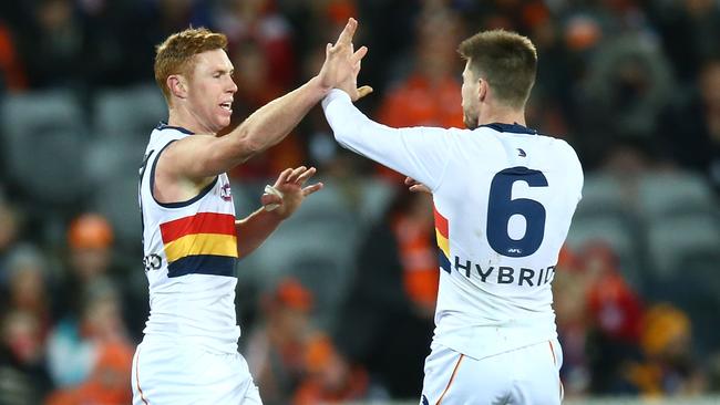 Tom Lynch celebrates a goal with Bryce Gibbs. Picture: Mark Nolan/Getty Images