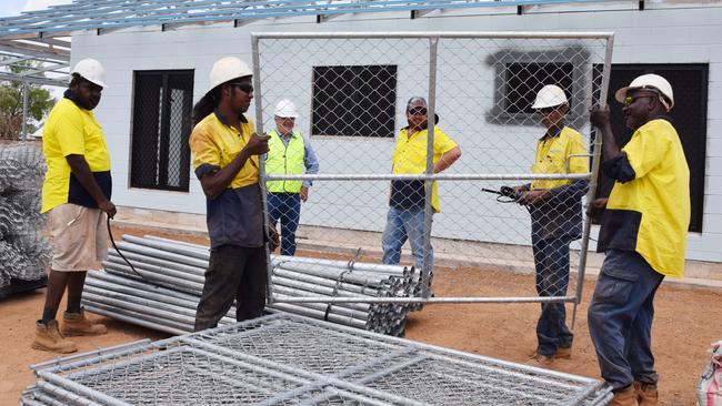 Remote Housing -  SHBuild - Minister for Local Government, Housing and Community Development Gerry McCarthy, Scott Hammet from SH Build,  Jeremy Cox, Charlie Nunumawuy, Sonny Ah Fat and Thomas Ah Fat at one of the Gunbalanya Homebuild NT Construction sites.