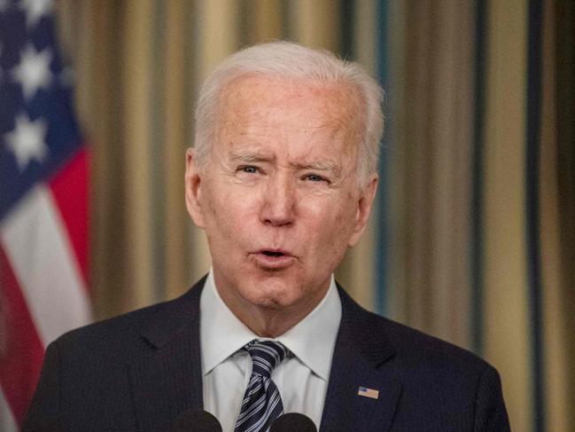 US President Joe Biden speaks during remarks on the implementation of the American Rescue Plan in the State Dining room of the White House in Washington, DC on March 15, 2021. (Photo by Eric BARADAT / AFP)