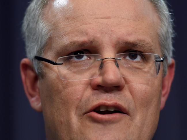 Australia's Treasurer Scott Morrison speaks to the media during a press conference at Parliament House in Canberra, Monday, Dec. 19, 2016. Australia's Treasurer Scott Morrison will hand down the Mid Year Economic and Fiscal Outlook (MYEFO). (AAP Image/Lukas Coch) NO ARCHIVING