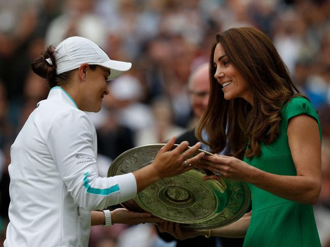 Ashleigh Barty receives the trophy from Catherine, Duchess of Cambridge, after defeating Czech Republic's Karolina Pliskova during their women's singles final match. Picture: AFP