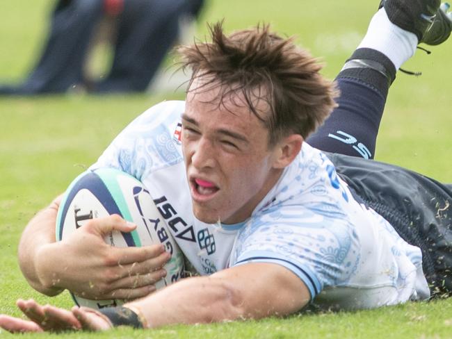 08/03/25. News Local. Sport. Daceyville, Sydney, NSW. Pics by Julian Andrews.Action pictures from the NSW Waratahs U20  V Western Force at Daceyville.TRY: Impressive fullback Brody McLaren scores