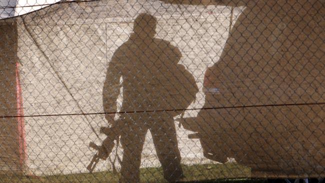 A NSW special operations police officer prepares to head into the bush to stalk Malcolm Naden. Picture: Supplied