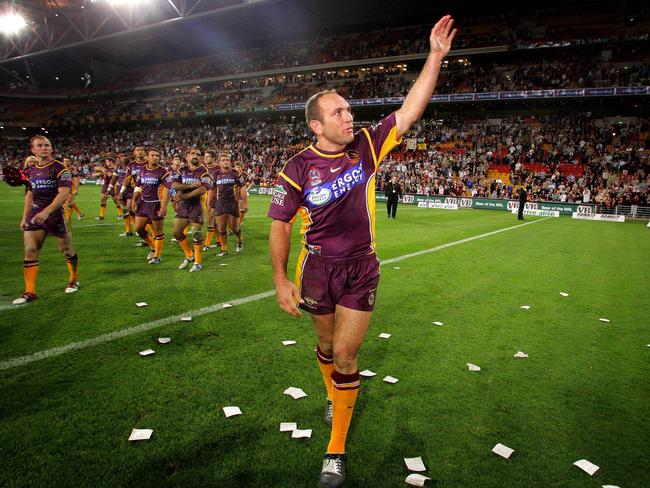 Tallis farewells the fans after his last game for the Broncos at Suncorp Stadium.