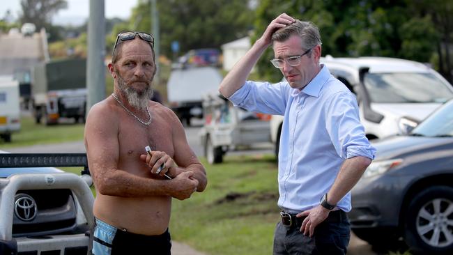 Premier Dominic Perrottet meets with Wayne Ryan in Coraki, a town that has only just opened up again after being cut off for days. Picture: Toby Zerna