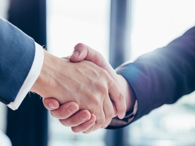 cropped shot of professional businessman shaking hands