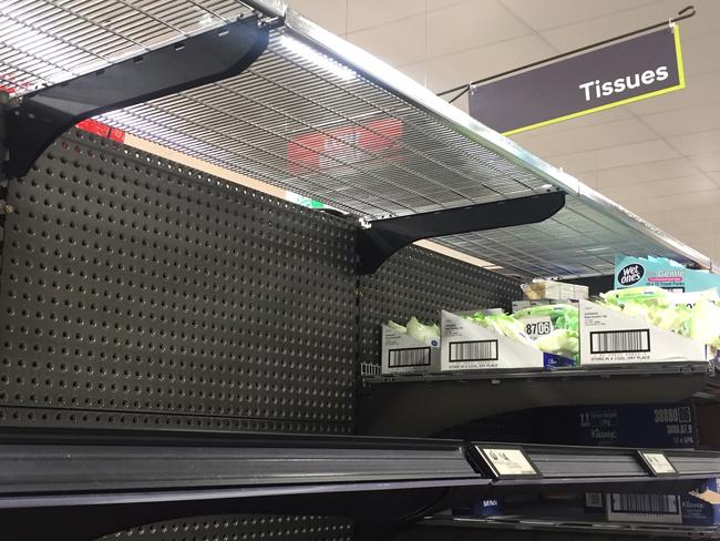 Empty shelves and labels showing tissues are in short supply at Coles and Woolworths. Picture: Supplied