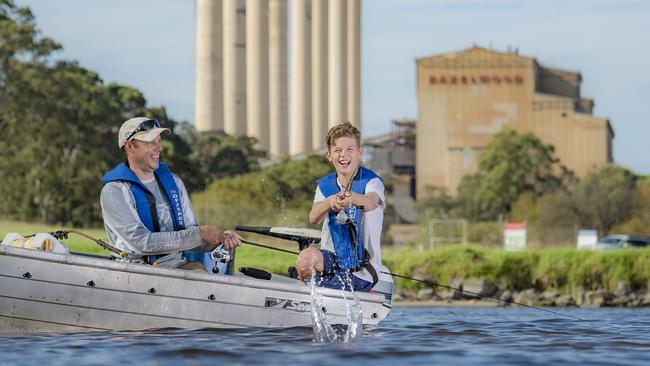 Adrian Line and son Kian, 11, fish for Barramundi at Hazelwood pondage. Picture: Jason Edwards