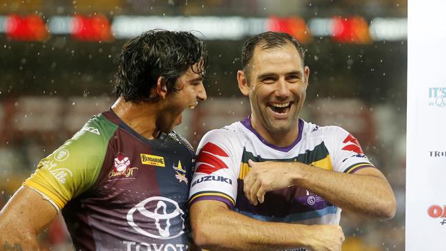 Johnathan Thurston and Cameron Smith during their testimonial game in 2018, years before Smith even considered retiring. Picture: AAP.