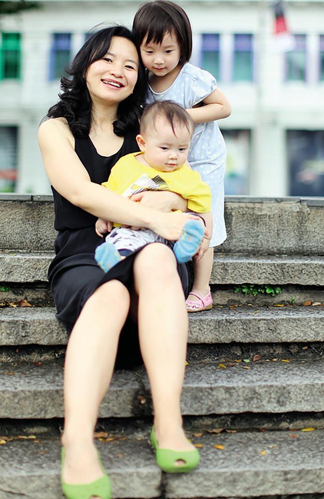 TV anchor, mother and extraordinary survivor … Cheng Lei with her children Ava and Alex in 2012, eight years before her jail nightmare began. Photo courtesy of Cheng Lei.