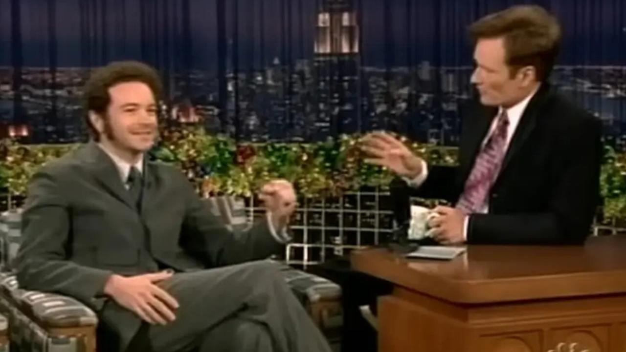 Alarming footage from 2004 shows Danny Masterson having a bizarre exchange with Conan O’Brien about having people feel his “balls.” Picture: NBC.